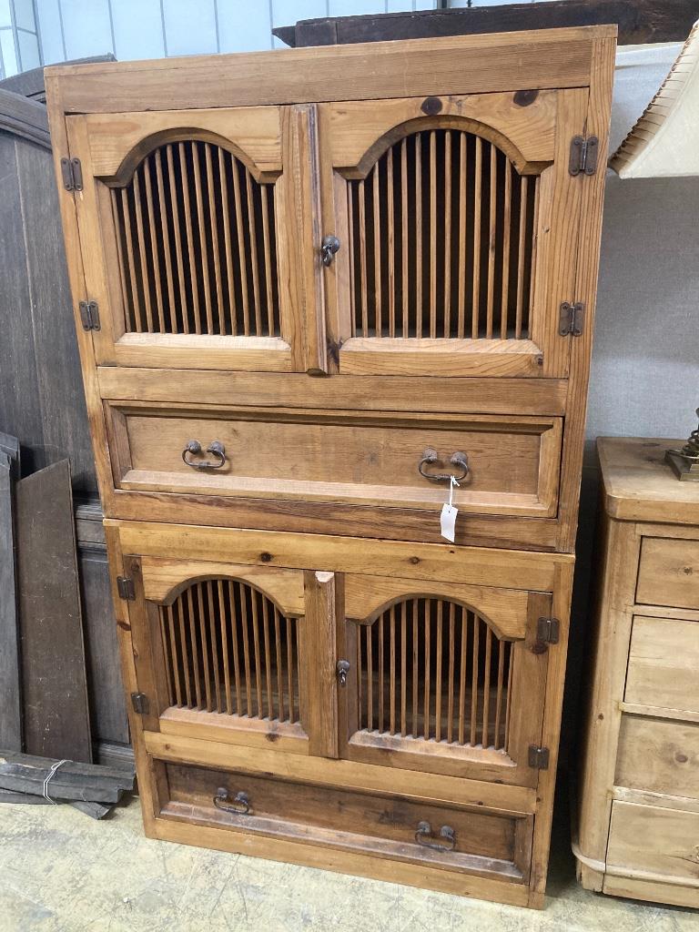 A Continental pine four door hutch cabinet, width 98cm, depth 46cm, height 175cm